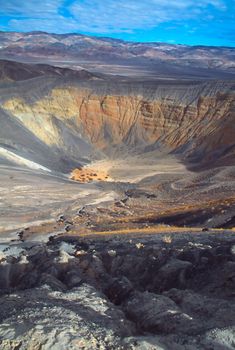 Ubehebe Crater is a large volcanic crater located at the north tip of the Cottonwood Mountains