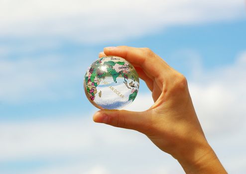 globe on the human hand