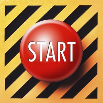 Red start button with white letters START on yellow and black background