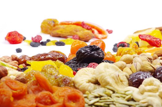 assorted dried fruits isolated on white