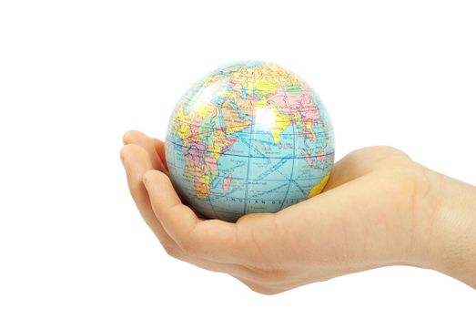 Hand holdings a globe on a white