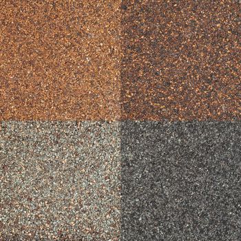 four textures of high impct asphalt roof shinglea in different tones of brown and gray color