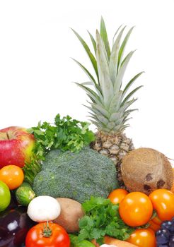 Fresh vegetables and fruits on white