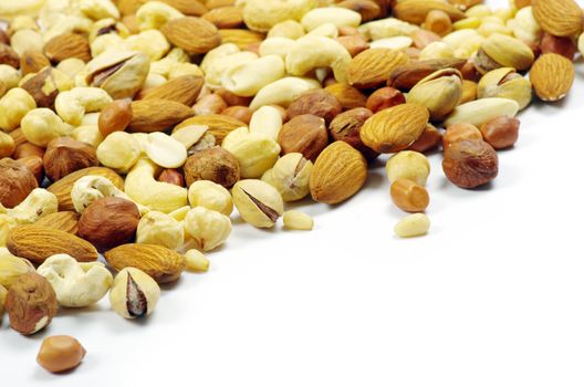 Assorted mixed nuts on white background