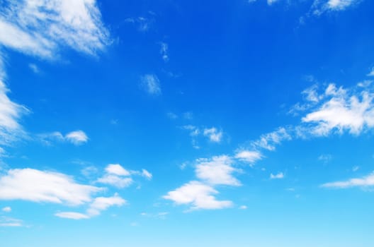blue sky background with tiny clouds