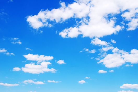 blue sky background with tiny clouds