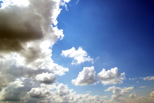 blue sky background with tiny clouds