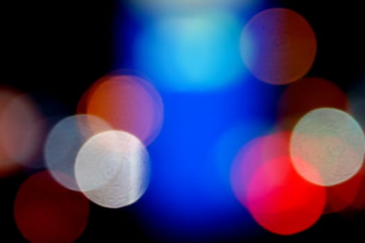 Defocused colorful light dots. Abstract background.