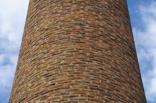 Brick chimney of an old derelict factory.