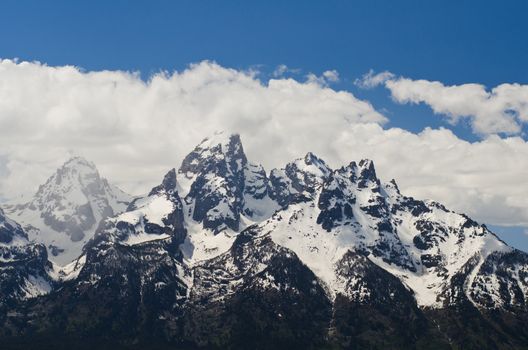 The Teton Mountain Range and clouds, Grand Teton National Park, Teton County, Wyoming, USA