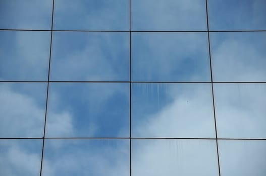 Glass facade of modern building. Architectural detail.