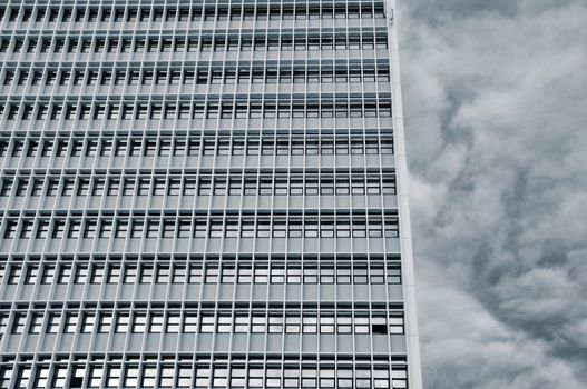 High rise urban building. Abstract modern architecture background.