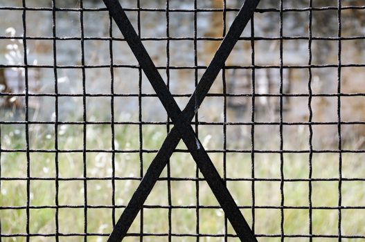 Vintage rusty metal door frame grid. Abstract background.