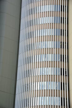 Glass facade of a modern office building. Architectural background.