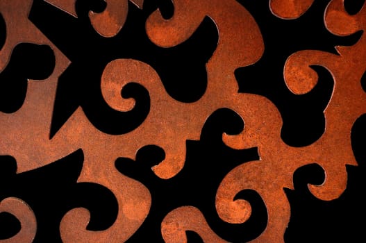 Rusty iron abstract decorative pattern. Vintage metalwork detail.