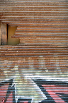 Rusty roll down corrugated metal shutter texture.