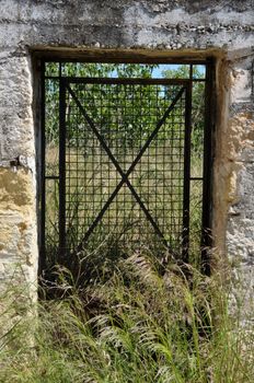 Vintage metal door frame in the country.