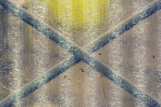 Corrugated transparent plastic sheeting. Abstract grungy background.