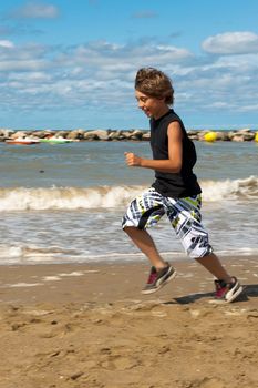 Running on the beach on a sunny day