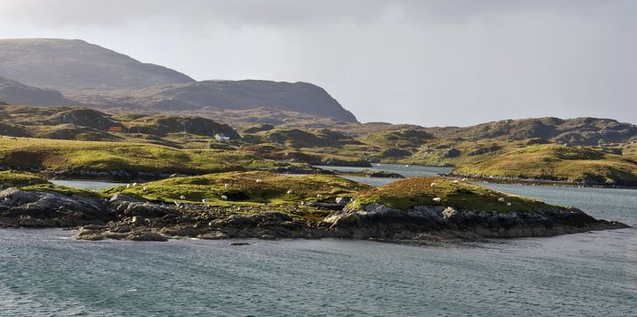 small isles at scotlands coast. rough and rural outdoor landscape
