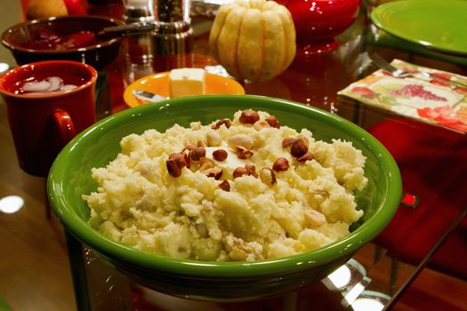 Thanksgiving Day Dinner Mashed Potatoes Dish with Filbert Hazelnuts and Butter