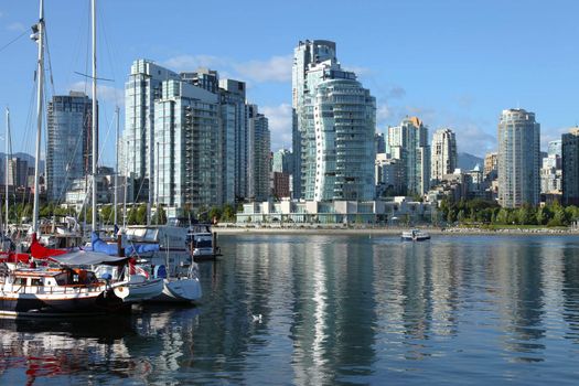 Vancouver BC.,skyline at False Creek and moored sailboats.