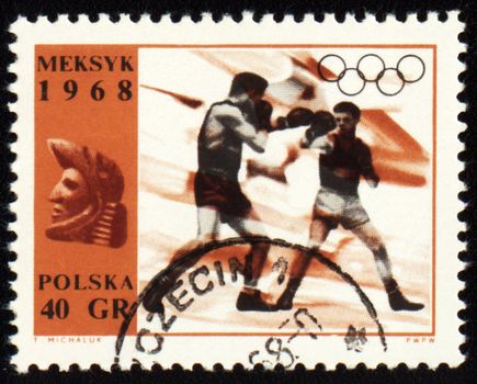 POLAND - CIRCA 1968: A post stamp printed in Poland shows boxing, devoted to Olympic games in Mexico, series, circa 1968