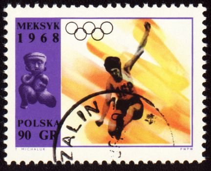 POLAND - CIRCA 1968: A post stamp printed in Poland shows broad jump, devoted to Olympic games in Mexico, series, circa 1968