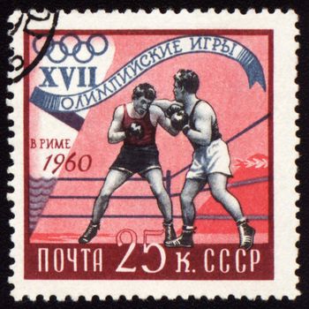 USSR - CIRCA 1960: A post stamp printed in USSR shows boxing, devoted Olympic games in Rome, series, circa 1960