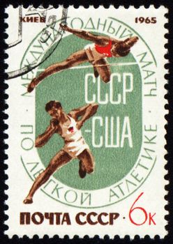 USSR - CIRCA 1965: A stamp printed in USSR, devoted Match Athletics between USSR and USA in Kiev, circa 1965