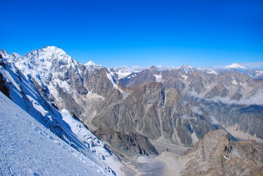 Winter mountains peaks with ice and snow