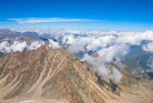 Winter mountains peaks with ice and snow