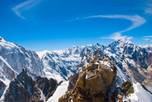 Winter mountains peaks with ice and snow