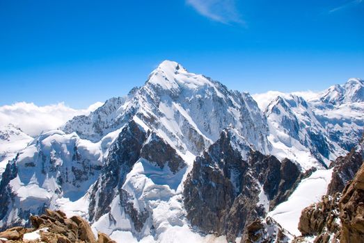 Winter mountains peaks with ice and snow