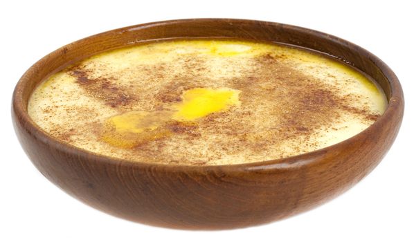 Traditional Norwegian sour cream porridge, with butter, sugar and cinnamon