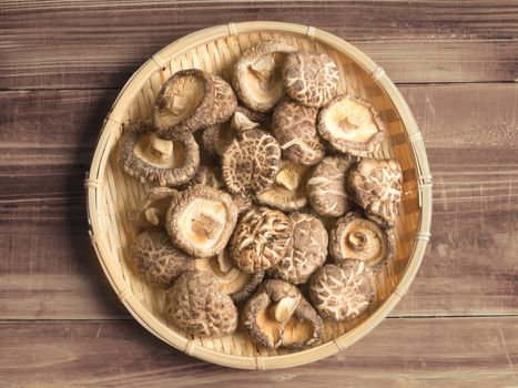 close up of a basket of dried shitake mushrooms