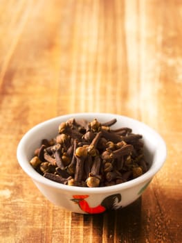 close up of cloves in a bowl