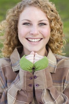 Pretty Young Smiling Woman Outdoor Portrait.