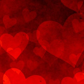 red heart of random sizes in a grunge background