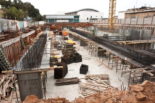 City urban construction site in early foundation building stage