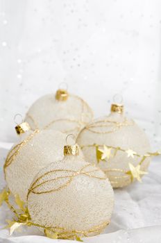 Christmas ball baubles with silver and gold decoration.