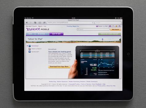 Kiev, Ukraine - May 17, 2011: Apple Ipad showing Yahoo web page on screen.