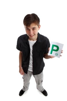 A teenager holds the green magnetic provisional  P plates for vehicle.  White background.