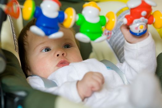 people series: little girl are play the game in cradle