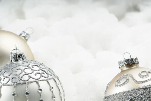 Three New Year's boubles sparkling on white