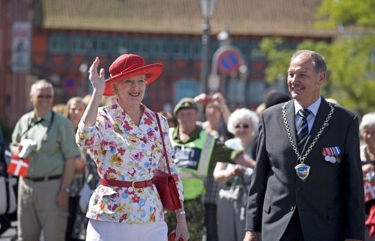 H M Queen Margrethe the 2nd of Denmark during her official visit to Nyborg,  Denmark on the 2nd of June 2009. Accompanied by lord mayor Joern Terndrup.