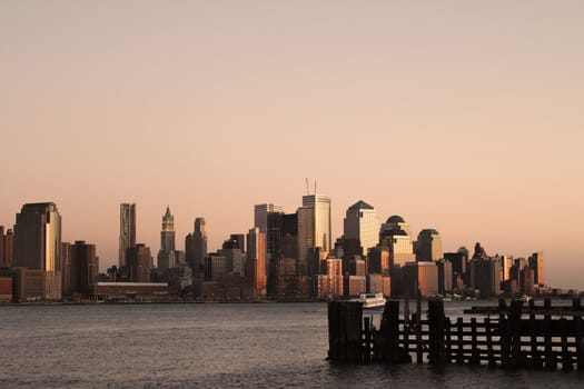 The skyline of Manhattan in New York City during sunset.