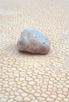 Racetrack Playa is a seasonally dry lake (a playa) located in the northern part of the Panamint Mountains in Death Valley National Park, California, U.S.A.. It is famous for 'sailing stones', rocks that mysteriously move across its surface.