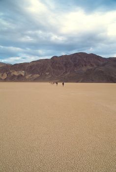 Racetrack Playa is a seasonally dry lake (a playa) located in the northern part of the Panamint Mountains in Death Valley National Park, California, U.S.A.. It is famous for 'sailing stones', rocks that mysteriously move across its surface.