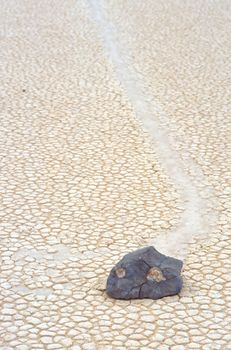 Racetrack Playa is a seasonally dry lake (a playa) located in the northern part of the Panamint Mountains in Death Valley National Park, California, U.S.A.. It is famous for 'sailing stones', rocks that mysteriously move across its surface.